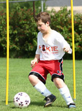 Boy playing soccer.